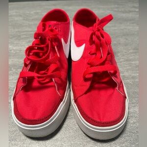 Women's Nike Court Legacy Canvas low-top sneakers in red with a white size 9.5